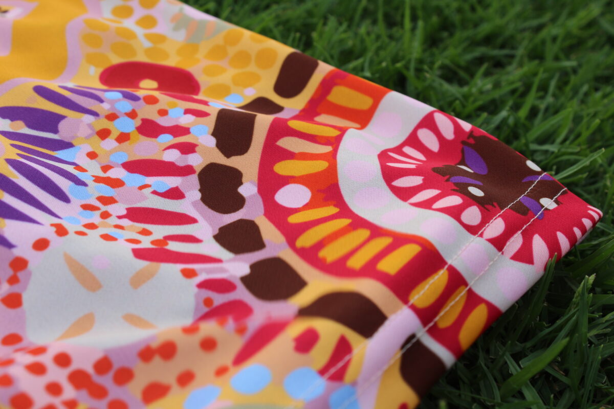 'As One' artwork by Alisha F featured on St Kevins GAC jersey