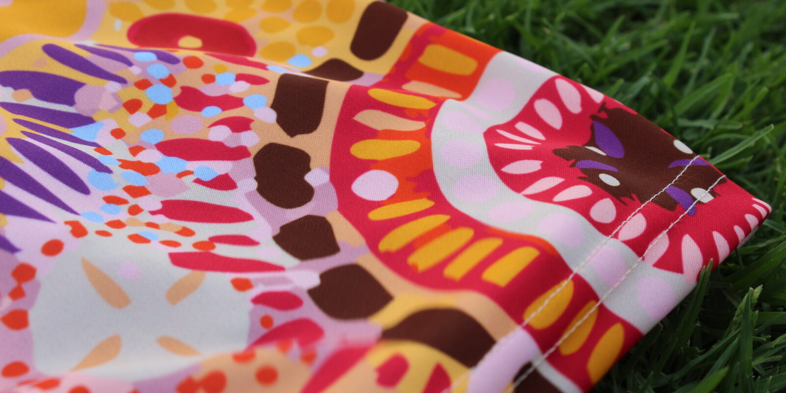 'As One' artwork by Alisha F featured on St Kevins GAC jersey